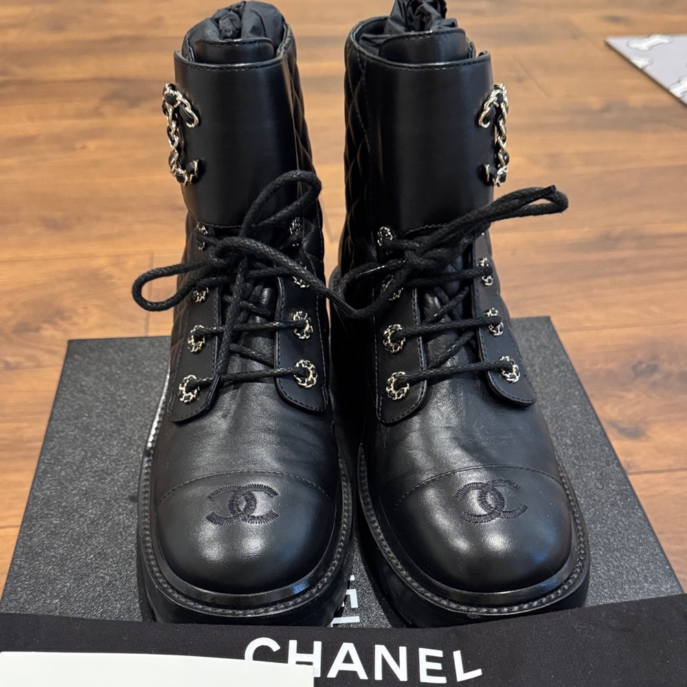 CHANEL Black Quilted Leather Lace-Up Combat Boots with Chain-Link Accents